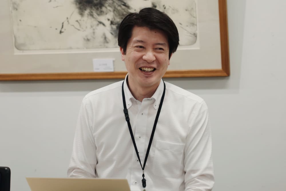 「進化し続けるヘルプデスク」というテーマに共感したことを語る様子